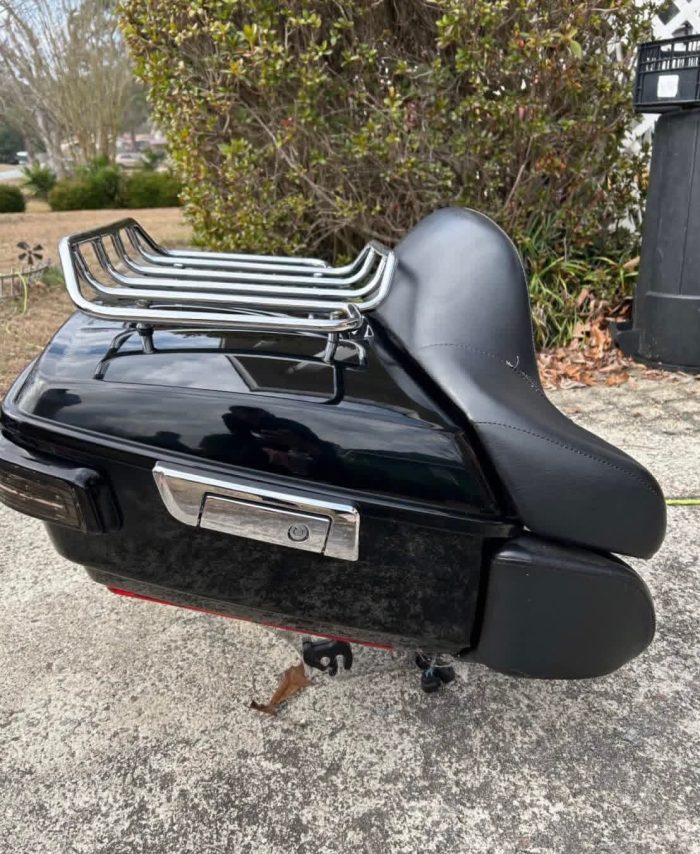 Clean black tour pack for Harley-Davidson chrome luggage rack and a comfy passenger seat with integrated speakers